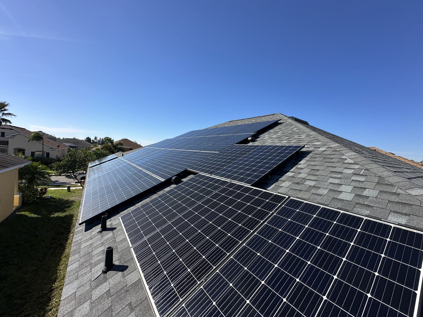 After: panels reinstalled on the new roof