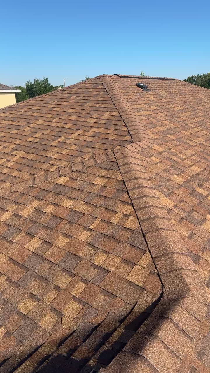 Finished ridge on a new shingle roof