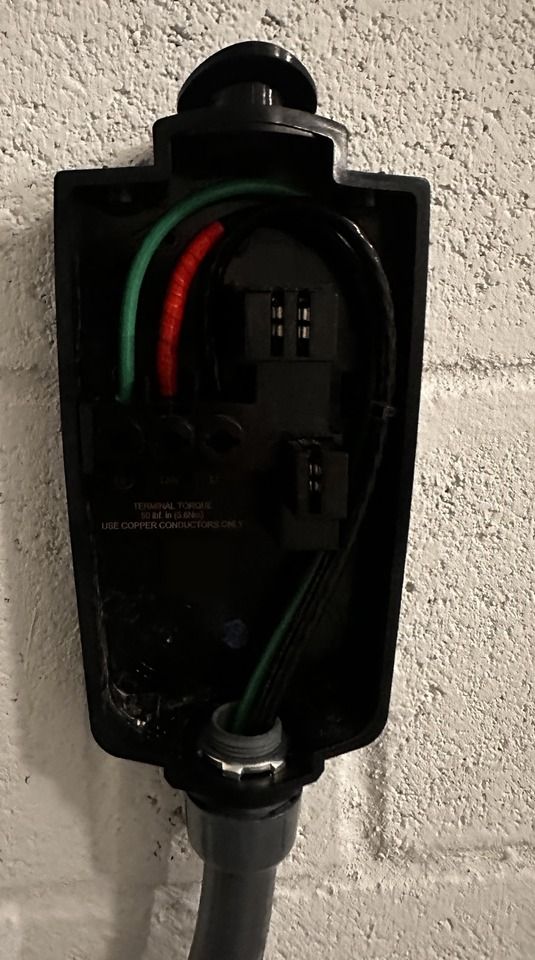 Before: Wall Connector backplate wired on its own circuit